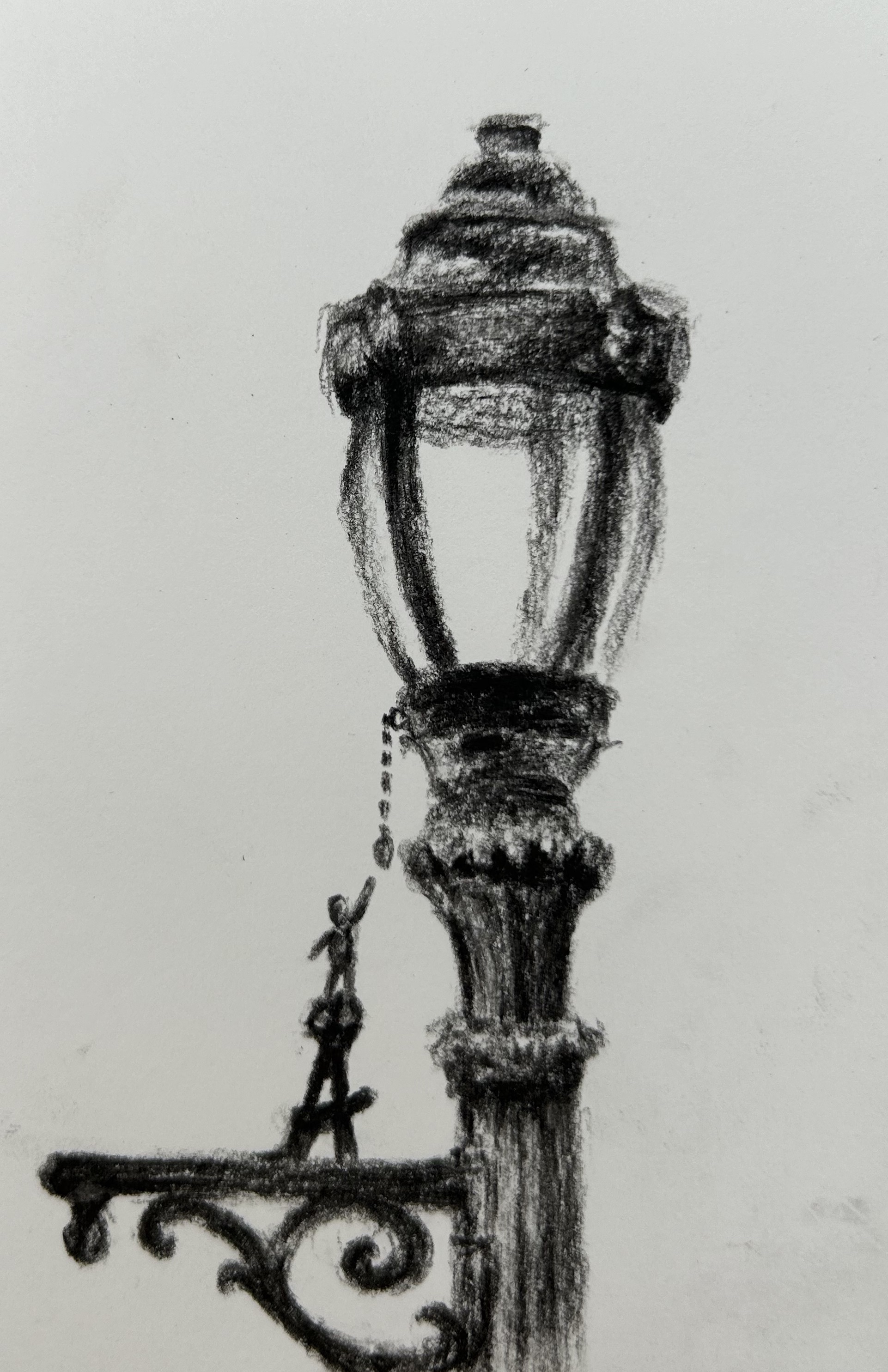City lamp with tiny people